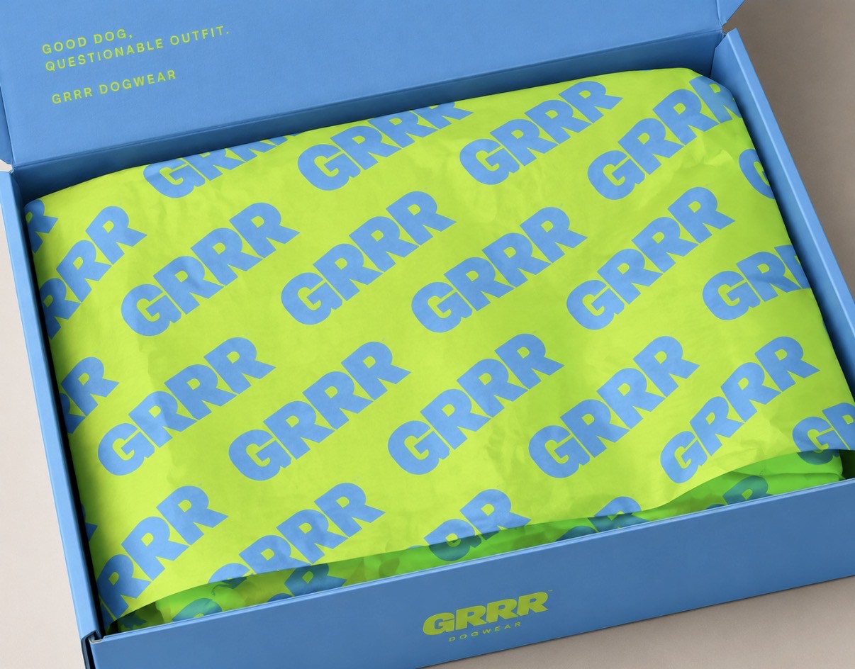 GRRR blue box with acid green logo tissue paper