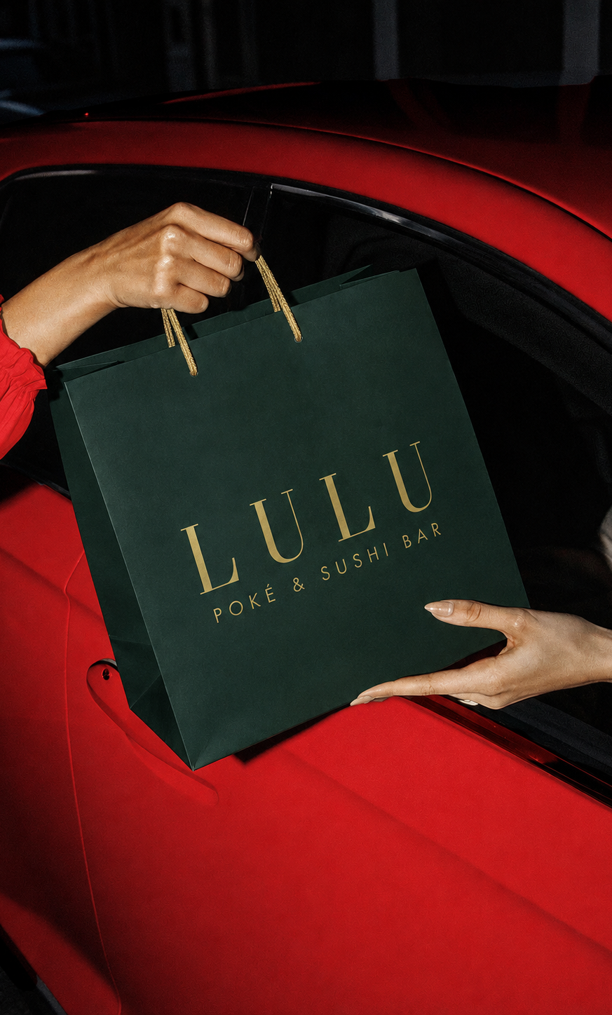 Lulu bag handed out of a car window
